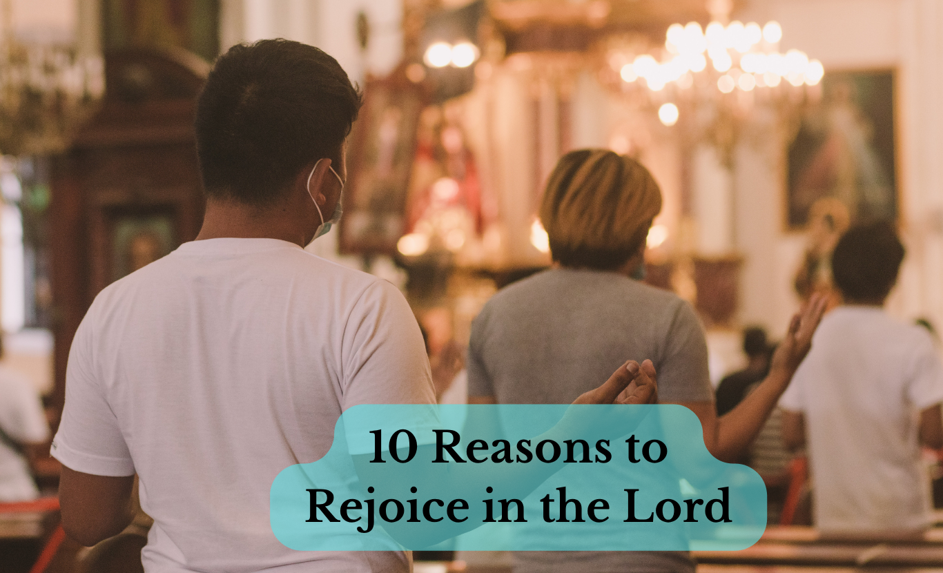 People praying with hands raised in worship