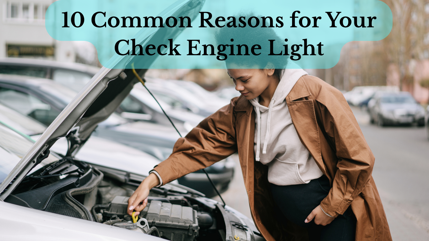 A person checking car engine under open hood