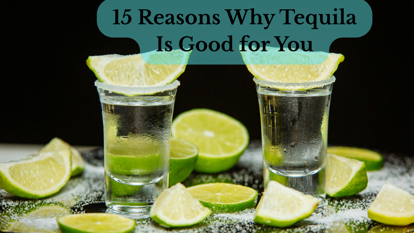 Glass of tequila with lime on wooden table